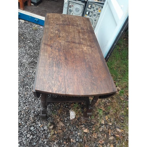 685 - Late 19th century solid oak gateleg dining table