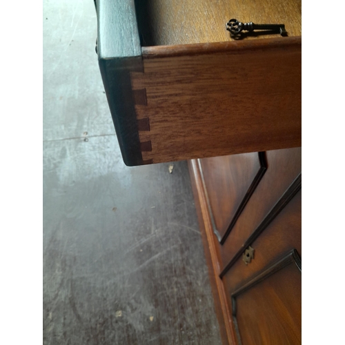 689 - 20th century mahogany veneer glazed bookshelf with cupboard under