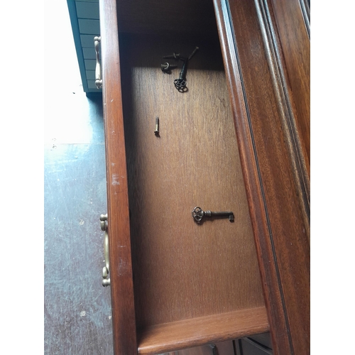 689 - 20th century mahogany veneer glazed bookshelf with cupboard under