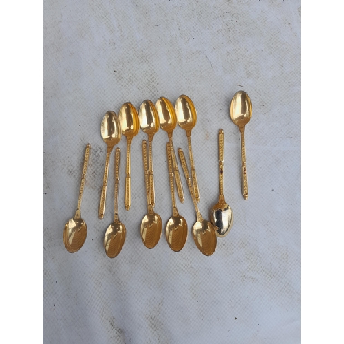 7 - Gilded lower grade metal tea spoons