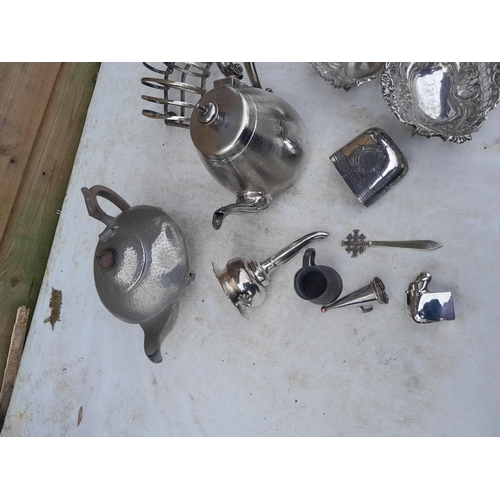 11 - Assorted silver plated and pewterware : Dansk desk weight, teapots , wine funnel toast rack etc.