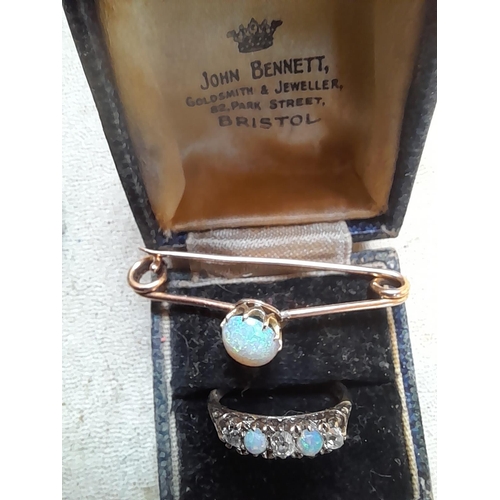 31 - 18 ct gold ring set with diamonds and opals size N with a matching bar brooch set with single opal i... 