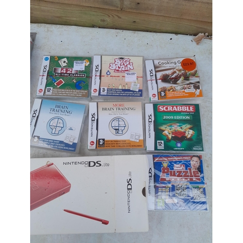 49 - Nintendo DS with games, some sealed etc.