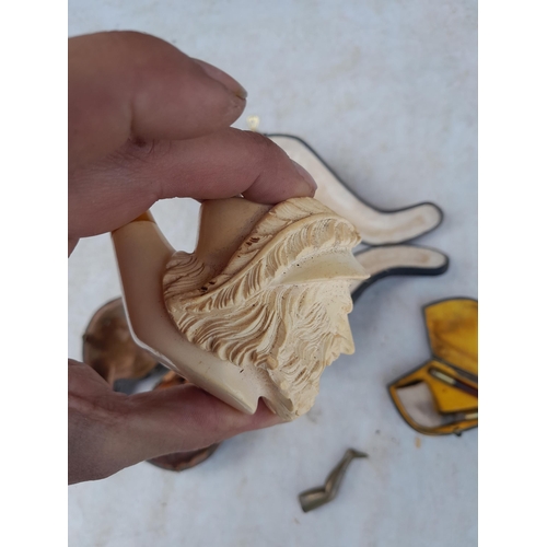 72 - Early 20th century carved meerschaum pipe modelled as a cavalier and one other and clay pipe