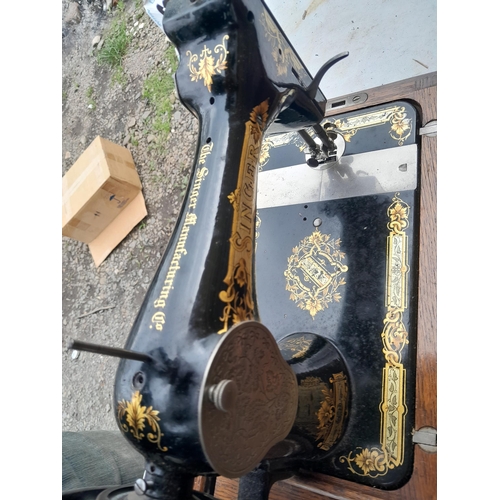 77 - Vintage Singer sewing machine in wooden case