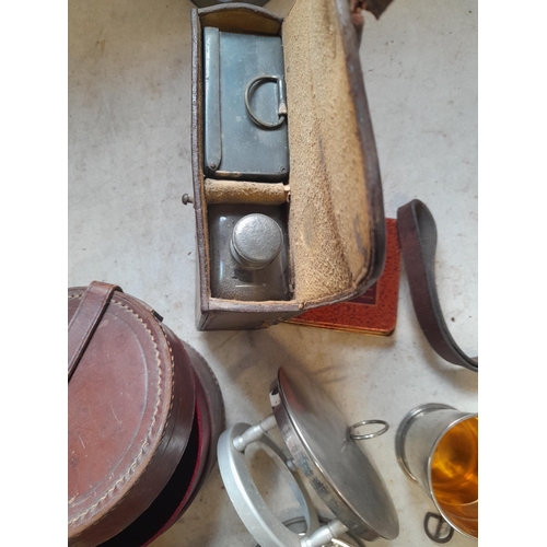 93 - Vintage automobilia : travelling related leather bound items, burner, cup etc. & tin of folding kniv... 