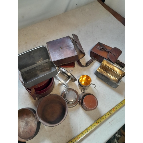 93 - Vintage automobilia : travelling related leather bound items, burner, cup etc. & tin of folding kniv... 