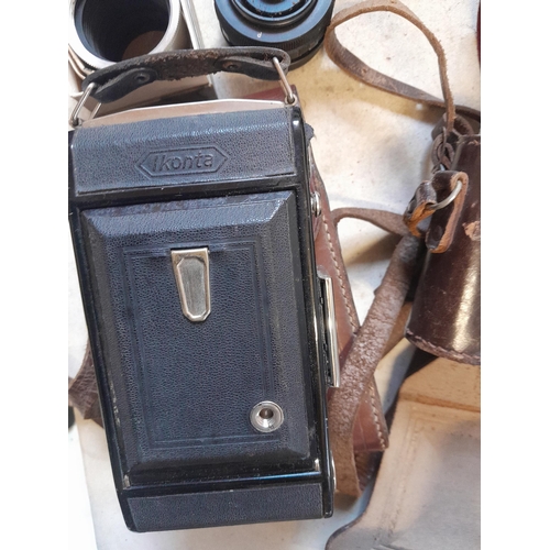 94 - Vintage cameras and accessories : Praktica , bellows cameras etc.