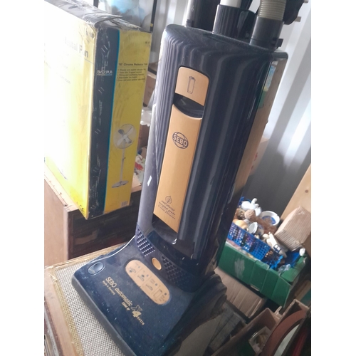 111 - Boxed floor standing fan & Sebo vacuum cleaner