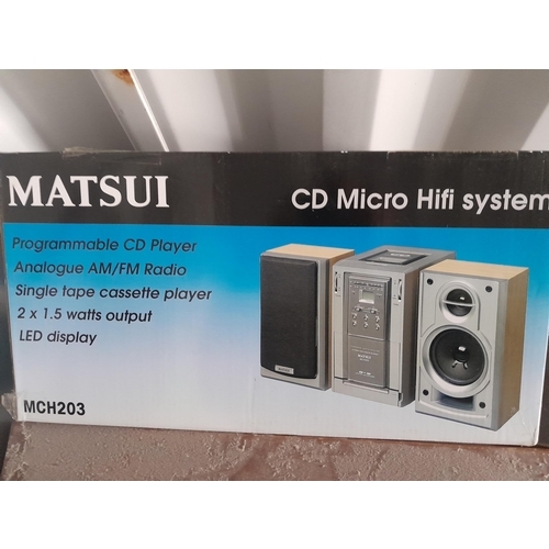 125 - Boxed new Matsui midi system