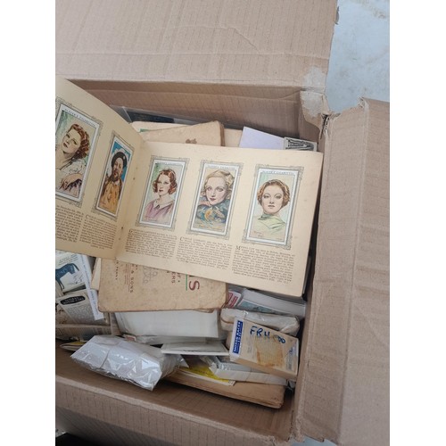 55 - Cigarette and trade cards loose in a box, reproduction cards included