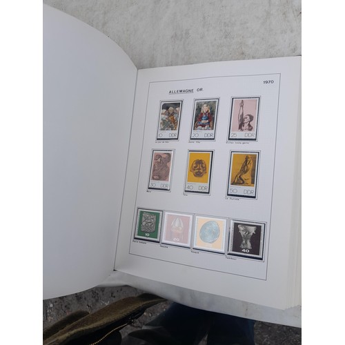 81 - Germany 4 x clean red Biella albums, well presented unmounted mint collection 1970 - 1995 with issue... 