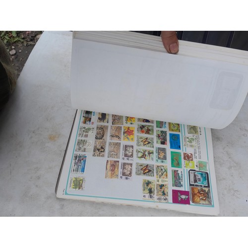 74 - Stamps : An all world stamp collection in various albums and stock books