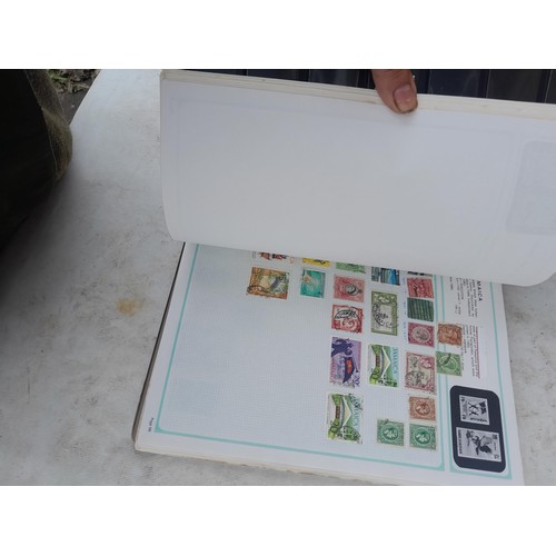 74 - Stamps : An all world stamp collection in various albums and stock books