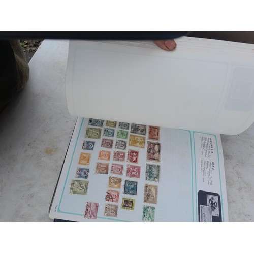 74 - Stamps : An all world stamp collection in various albums and stock books