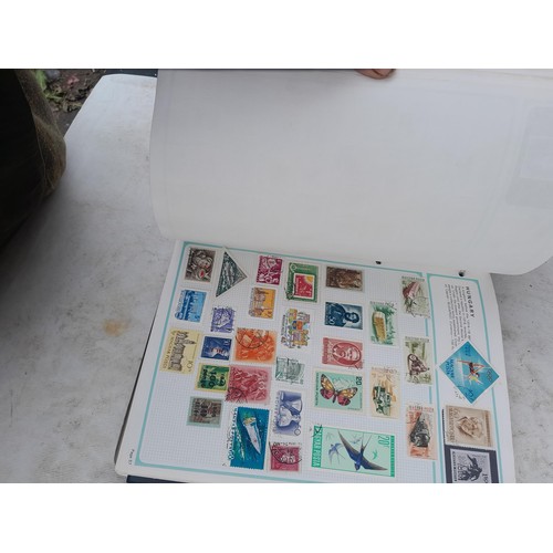 74 - Stamps : An all world stamp collection in various albums and stock books