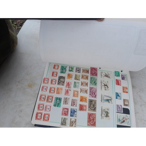 74 - Stamps : An all world stamp collection in various albums and stock books