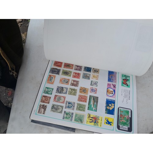 74 - Stamps : An all world stamp collection in various albums and stock books