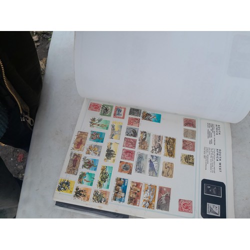 74 - Stamps : An all world stamp collection in various albums and stock books