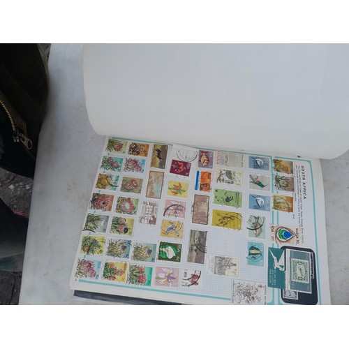 74 - Stamps : An all world stamp collection in various albums and stock books