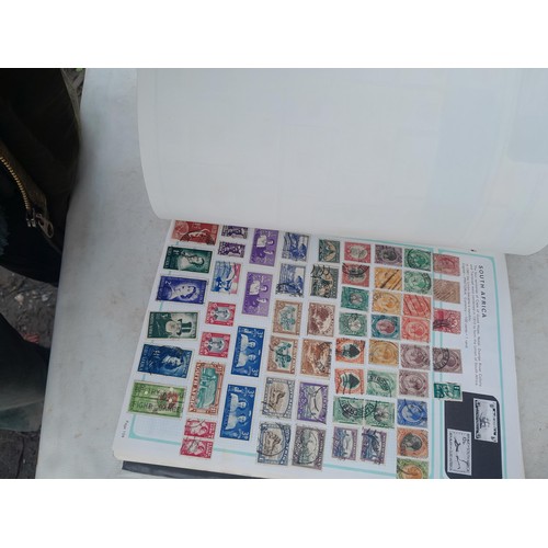 74 - Stamps : An all world stamp collection in various albums and stock books