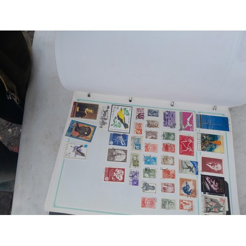 74 - Stamps : An all world stamp collection in various albums and stock books