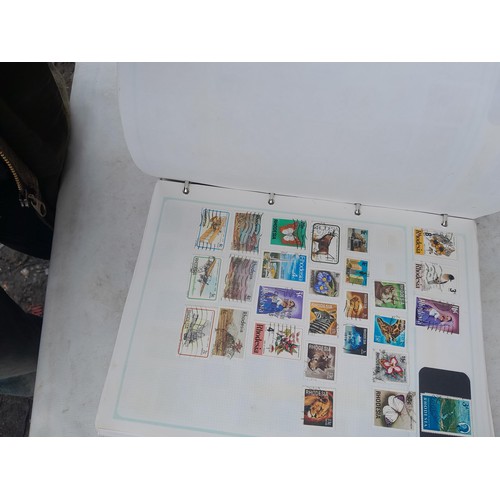 74 - Stamps : An all world stamp collection in various albums and stock books