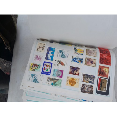 74 - Stamps : An all world stamp collection in various albums and stock books