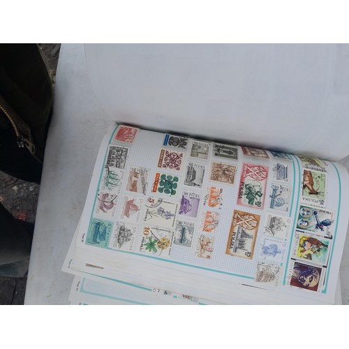 74 - Stamps : An all world stamp collection in various albums and stock books