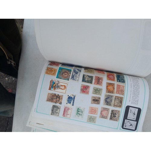 74 - Stamps : An all world stamp collection in various albums and stock books