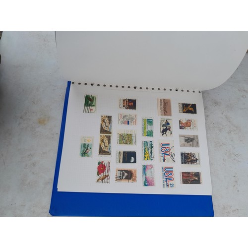 74 - Stamps : An all world stamp collection in various albums and stock books