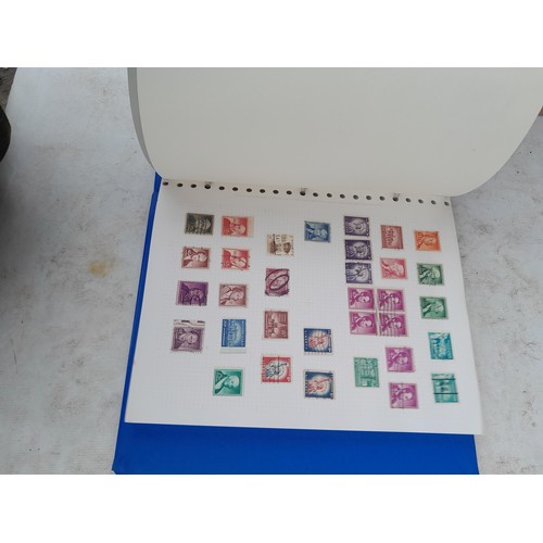 74 - Stamps : An all world stamp collection in various albums and stock books