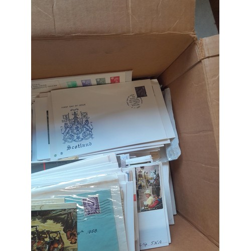 61 - Box containing a large amount of loose Stamp First Day Covers