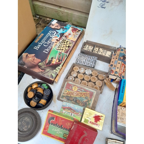 129 - Vintage toys games puzzles and playing cards, some sealed