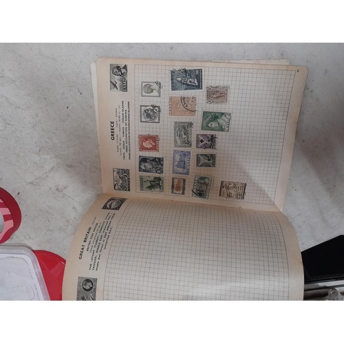 143 - Schoolboy sparsely filled World stamp album, other stamps on loose sheets mounted used, pictures etc... 