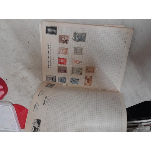 143 - Schoolboy sparsely filled World stamp album, other stamps on loose sheets mounted used, pictures etc... 