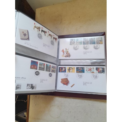 261 - Collection of Stamp First Day covers in three albums from the 1980s and Historic Vehicles coin set