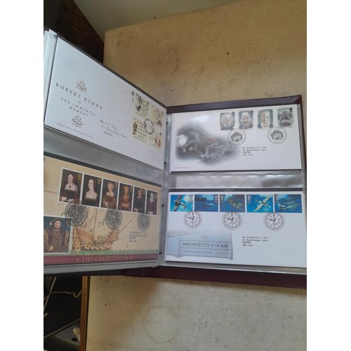 261 - Collection of Stamp First Day covers in three albums from the 1980s and Historic Vehicles coin set