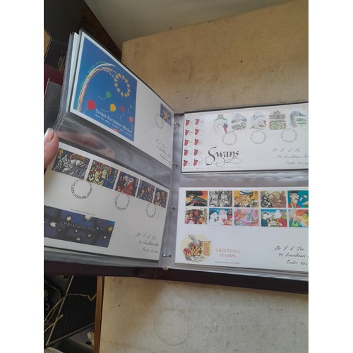 261 - Collection of Stamp First Day covers in three albums from the 1980s and Historic Vehicles coin set