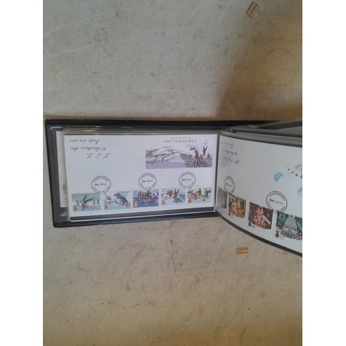 261 - Collection of Stamp First Day covers in three albums from the 1980s and Historic Vehicles coin set