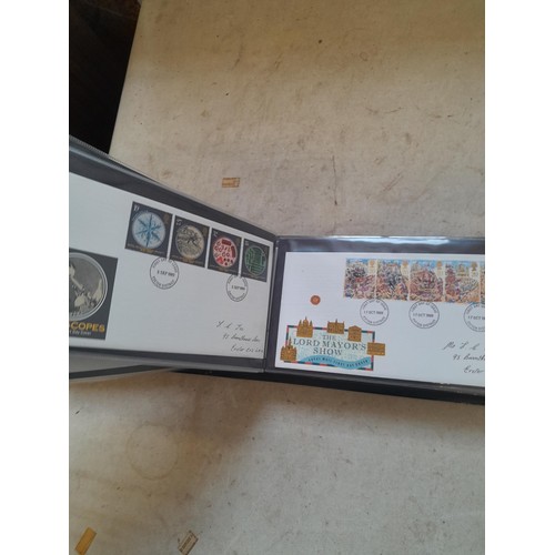 261 - Collection of Stamp First Day covers in three albums from the 1980s and Historic Vehicles coin set