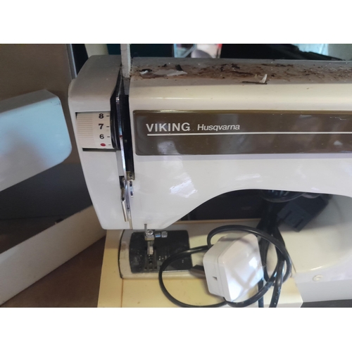 294 - Viking Husqvarna sewing machine in plastic case