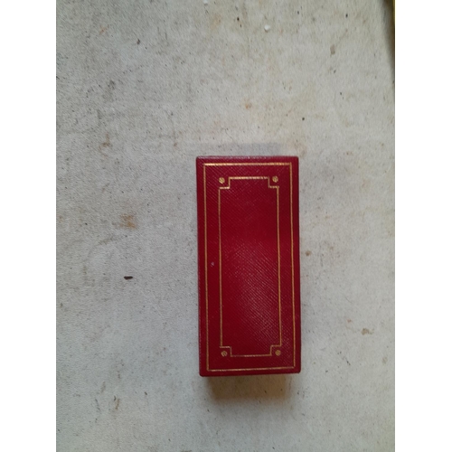 471 - A fine example of a Cartier ladies cigarette lighter in original box of issue, the engine turned dec... 