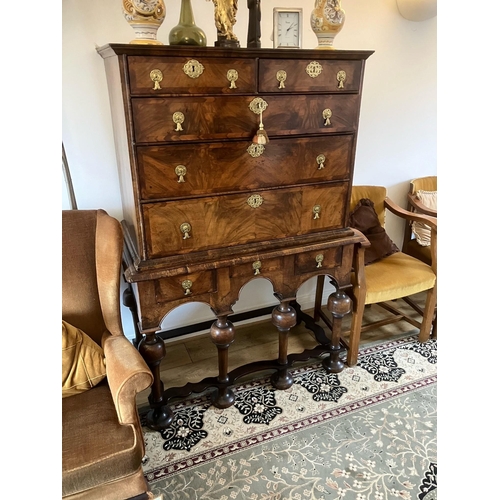 14 - An impressive William and Mary chest on stand with two short and three longs drawers over three furt... 