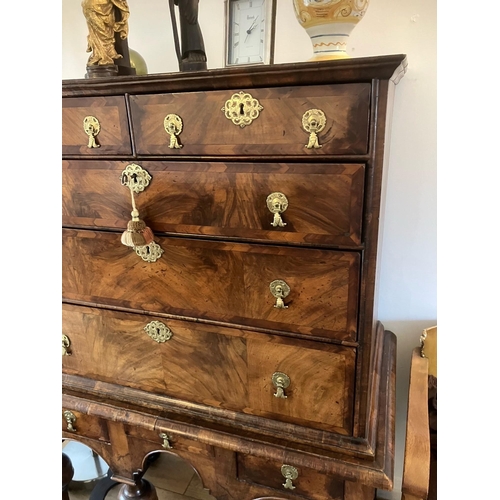 14 - An impressive William and Mary chest on stand with two short and three longs drawers over three furt... 