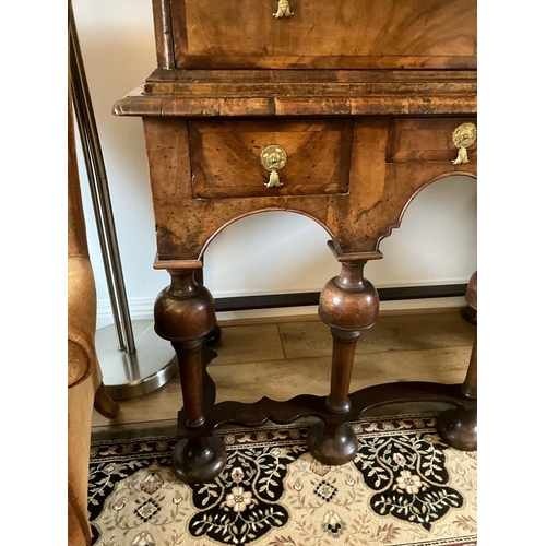 14 - An impressive William and Mary chest on stand with two short and three longs drawers over three furt... 