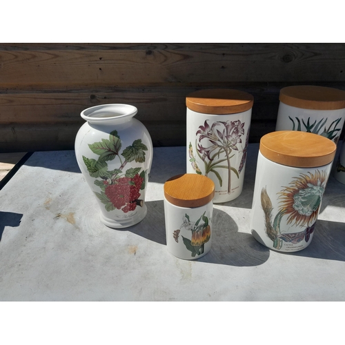 9 - Assorted pieces of Portmeirion Botanicals pottery : storage jars, vase etc.