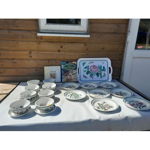 11 - Assorted pieces of Portmeirion Botanicals pottery : plates , soup bowls on saucers , plastic tray et... 