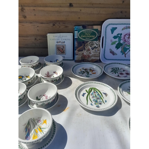 11 - Assorted pieces of Portmeirion Botanicals pottery : plates , soup bowls on saucers , plastic tray et... 