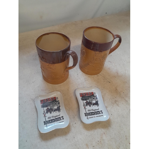 23 - 2 x Royal Doulton stoneware tankards with 2 x ashtrays